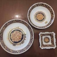 Set di piatti in porcellana Limoges ed oro