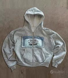 Felpa grigia con zip