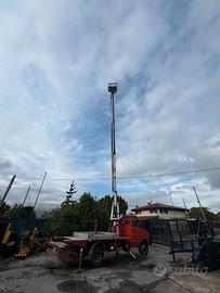 M144 - IVECO DAILY CON PIATTAFORMA CESTA AEREA