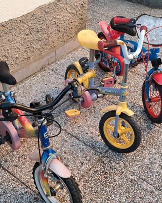 Biciclette raggio 12/14 con Rotelle per bambini
