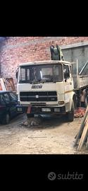 Iveco 130 con gru gromach e ribaltabile