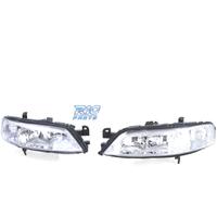 FARI PER OPEL VECTRA B 99-02 FONDO CROMATO