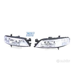 FARI PER OPEL VECTRA B 99-02 FONDO CROMATO