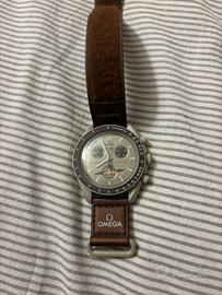 Swatch Omega Saturno