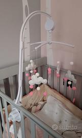 Giostrina neonata con braccio carrillon