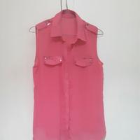 camicetta  rosa fucsia con borchie argentate 