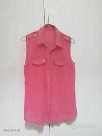 camicetta  rosa fucsia con borchie argentate 