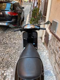 Vespa et4 125