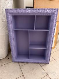 Pezzo d’arredo portoggetti con cornice