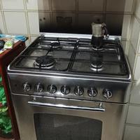 Cucina a gas Rex  con 4 fuochi e forno elettrico 
