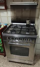 Cucina a gas Rex  con 4 fuochi e forno elettrico 