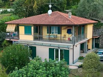 Villa singola di 8 locali, box, e giardino