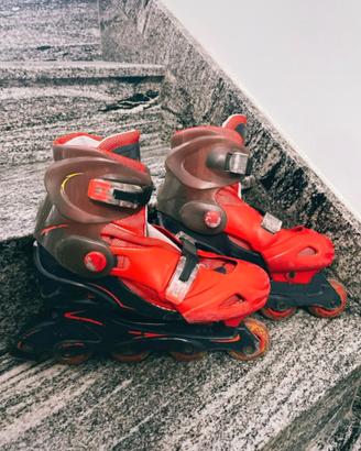 Pattini in linea a rotelle