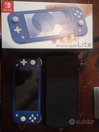 Nintendo Switch lite + 8 giochi. 