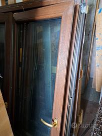 Infissi in PVC Schuco color castagno