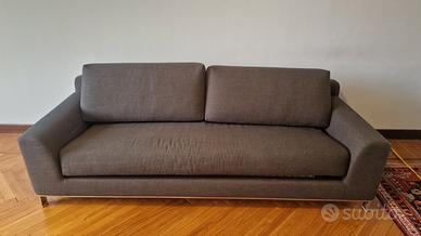 divano letto in tessuto grigio