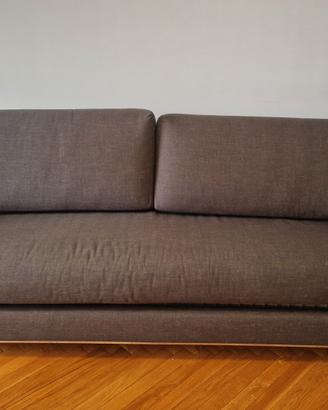 divano letto in tessuto grigio