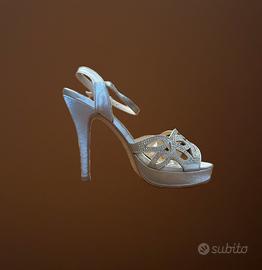 Scarpe argentate con tacco e plateau 38
