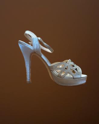 Scarpe argentate con tacco e plateau 38