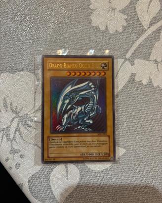 Carta yugioh drago bianco occhi blu