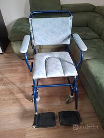 sedia con rotelle