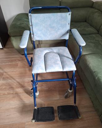 sedia con rotelle