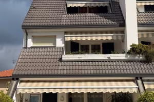 Villetta a schiera con giardino e garage