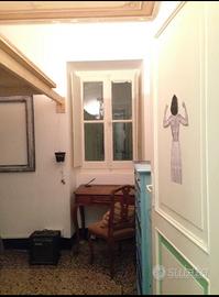 Piccola stanza libera in casa condivisa