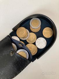 Porta monete con monete