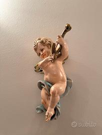 Coppia di putti decorativi vintage
