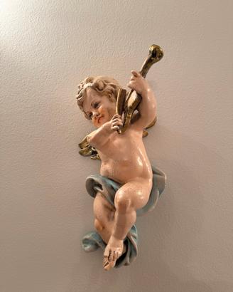 Coppia di putti decorativi vintage