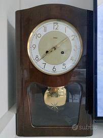 orologio pendolo a muro