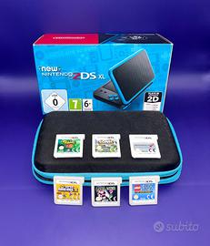 New Nintendo 2DS XL + custodia + giochi + scatola