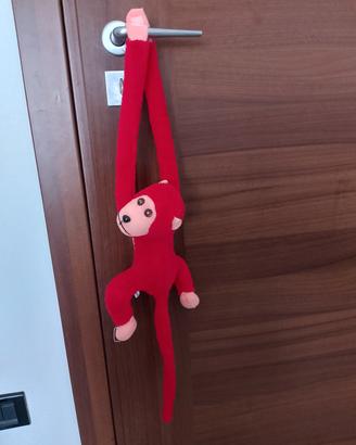 Peluche scimmia con lo strappo e interruttore