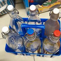 Doppio set di 6 bottiglie con portabottiglie 