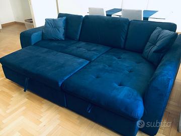 Divano letto elegante in velluto blu con penisola