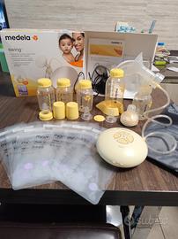 tiralatte Medela Swing + Accessori