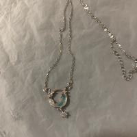 Collana con cerchio blu, brillantini e stellina