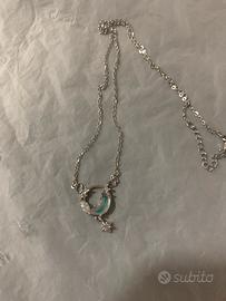 Collana con cerchio blu, brillantini e stellina