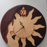 Orologio da parete in legno fatto a mano