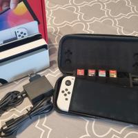 Nintendo Switch OLED  + 4 Giochi + custodia tomtoc