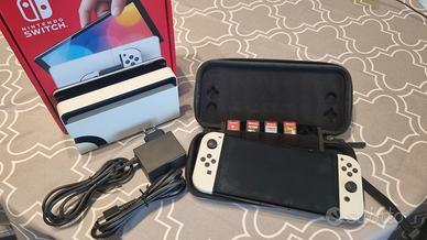 Nintendo Switch OLED  + 4 Giochi + custodia tomtoc