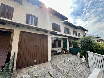 VILLA A SCHIERA A COCQUIO-TREVISAGO