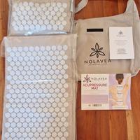 Tappetino e cuscino per agopressione