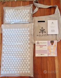 Tappetino e cuscino per agopressione