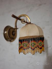 lampada comodino e lampada a muro