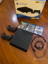 Ps4 slim 1tb + 2 DualShock + giochi