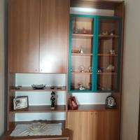 libreria in legno come nuova. a euro 150 è vetrina