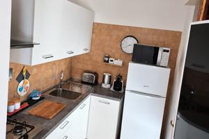 FIUMICINO BILOCALE ARREDATO Con GIARDINO PRIVATO