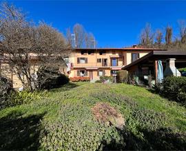 Porzione di casa vista lago con giardino privato